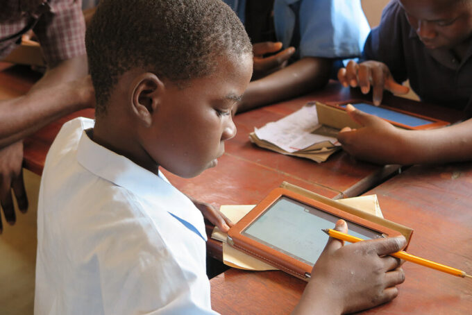 Child using a tablet for school work