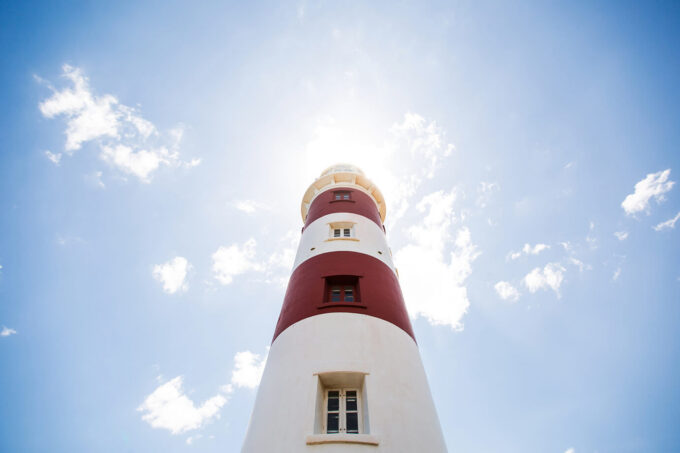 Lighthouse on blue sky background on Mauritius