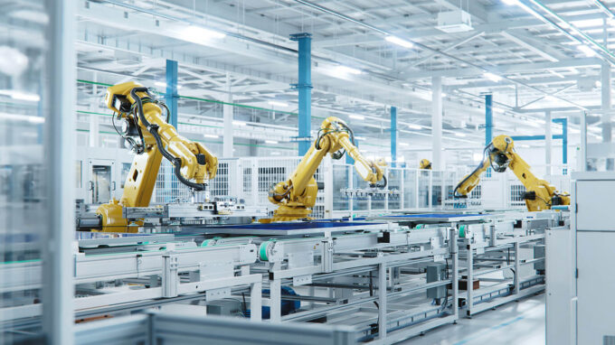 Robot arms on a factory assembly line