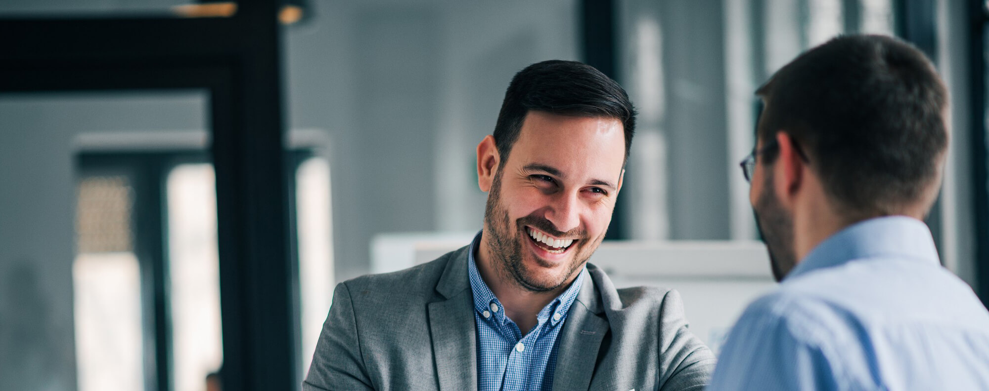 Man smiling during interview