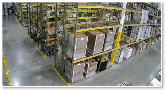 Shelves in a warehouse with boxes on it